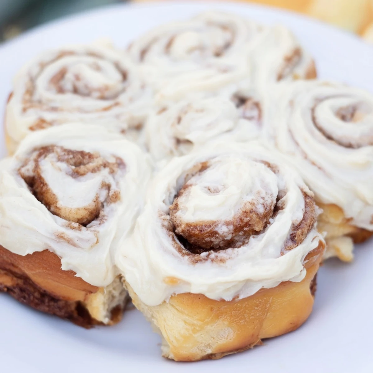 Imagine a close-up of the delicious, swirly layers of fresh TikTok Heavy Cream Cinnamon Rolls.