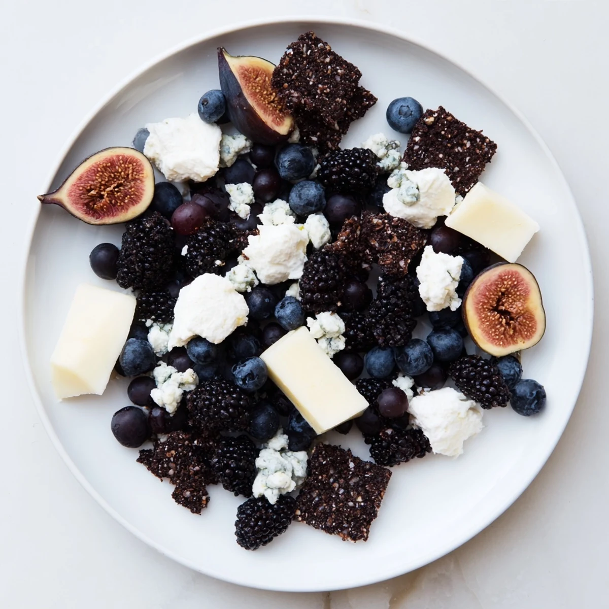 Get inspired: This Deep Indigo Midnight Sky recipe beautifully presents a vegetarian cheese board bursting with textures.