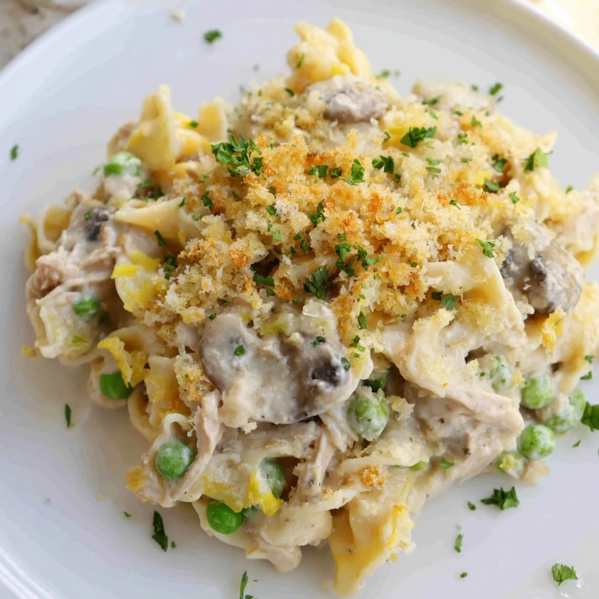 A baking dish filled with savory Tuna Noodle Casserole 2.0, ready to savor and enjoy.