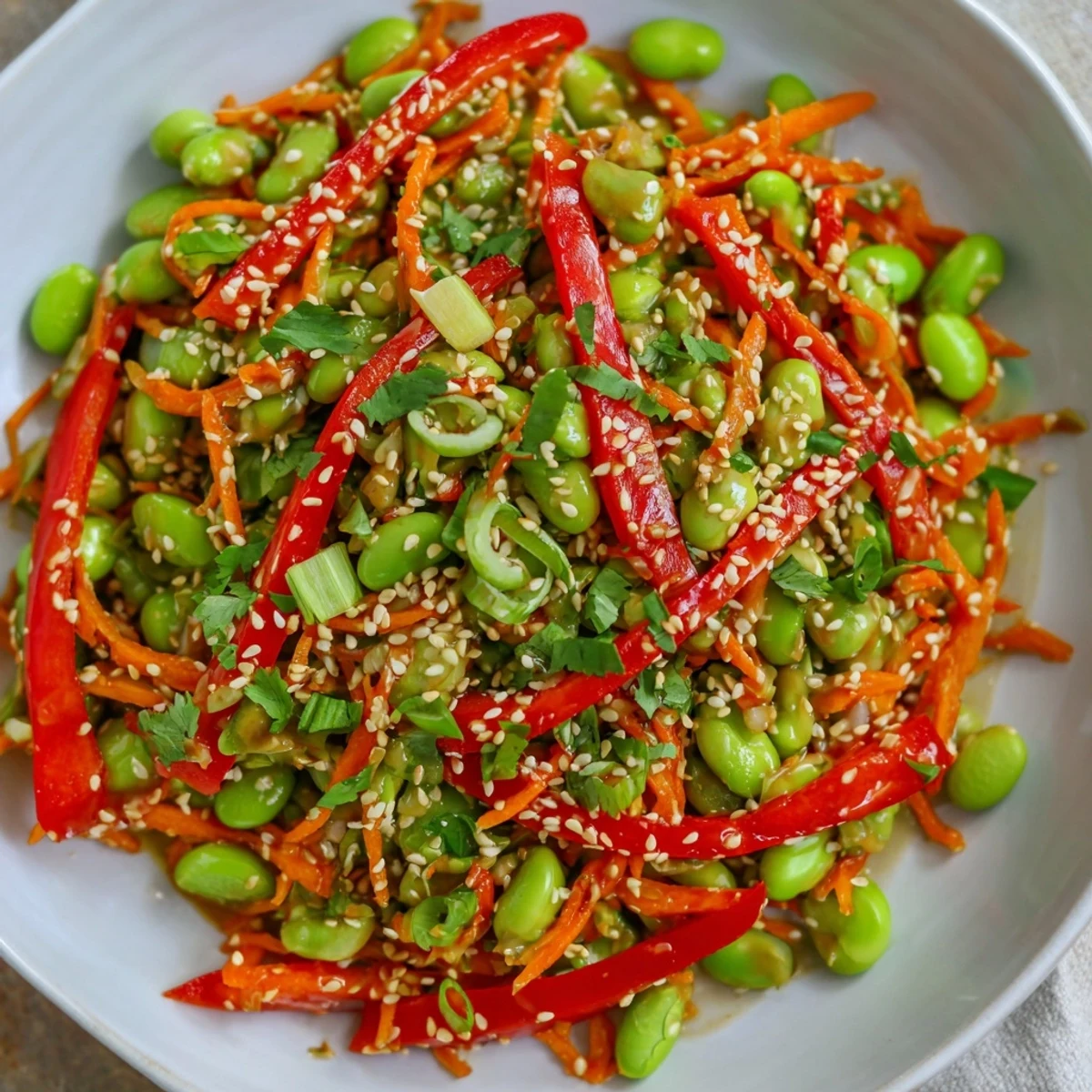 Vibrant Asian Edamame Salad with sesame seeds, a fresh and flavorful vegan recipe.