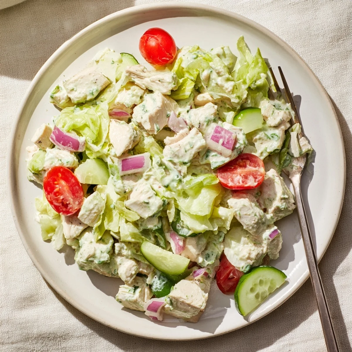 Zesty Jalapeño Ranch Chicken Salad served chilled on a white plate, ideal for a light lunch or potluck.