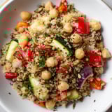 This vibrant Quinoa Power Protein Salad includes fluffy quinoa and fresh spinach tossed together.