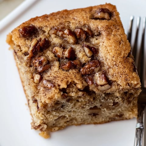 Rich spiced maple pecan blondies topped with crunchy nuts and warm spices.  