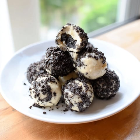 Cream Cheese Oreo Protein Balls with crushed Oreos, a creamy, no-bake, protein-packed snack.