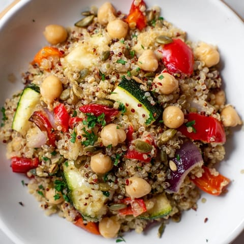 This vibrant Quinoa Power Protein Salad includes fluffy quinoa and fresh spinach tossed together.