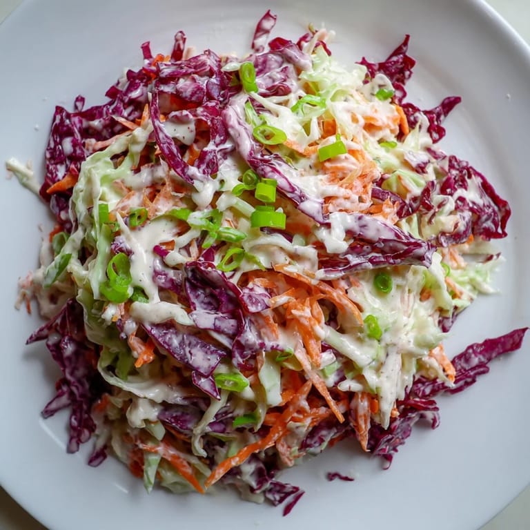 Enjoy this easy Quick Coleslaw Salad with Creamy Dressing: a cool, crunchy side perfect for barbecues and summer meals.